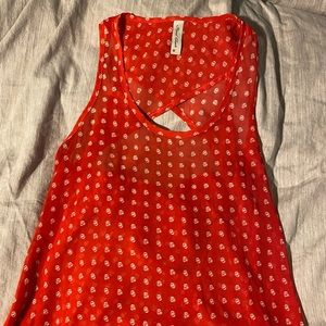 Red blouse with back cross opening